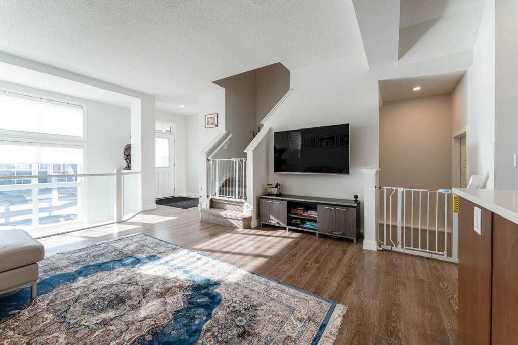 318 Masters Row Se, Calgary, AB - Indoor Photo Showing Living Room