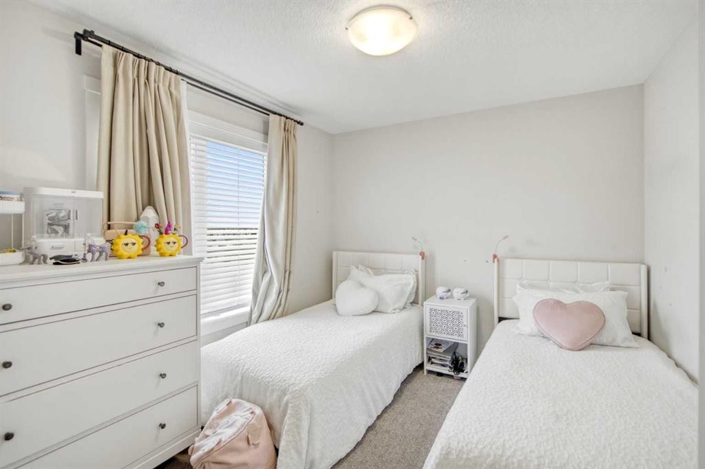 408-474 Seton Circle Se, Calgary, AB - Indoor Photo Showing Bedroom
