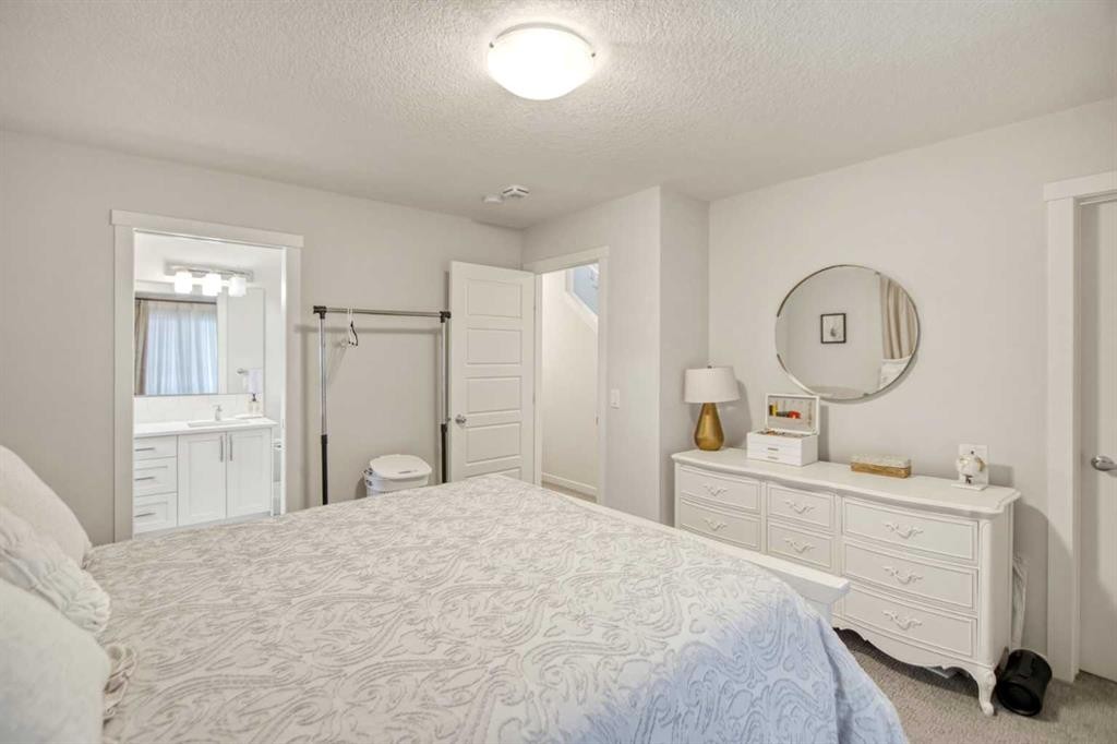408-474 Seton Circle Se, Calgary, AB - Indoor Photo Showing Bedroom
