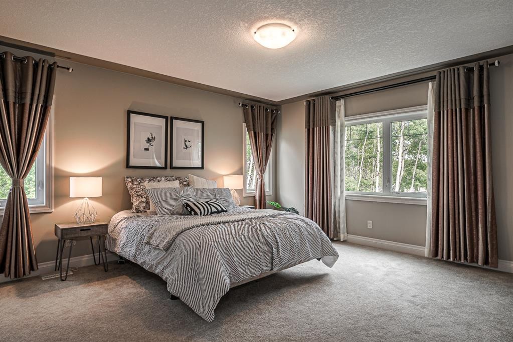 180 Ascot Drive Sw, Calgary, AB - Indoor Photo Showing Bedroom