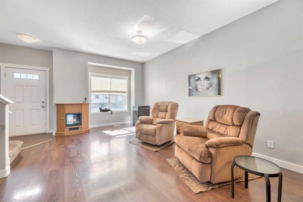 238 Ranch Ridge Meadow, Strathmore, AB - Indoor Photo Showing Living Room With Fireplace