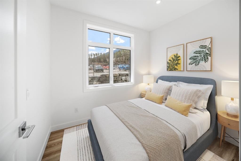 104-10 Cascade Ridge, Canmore, AB - Indoor Photo Showing Bedroom