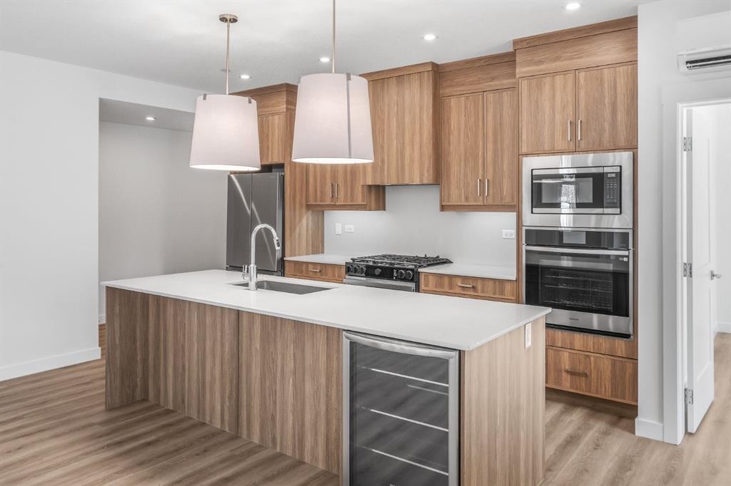 104-10 Cascade Ridge, Canmore, AB - Indoor Photo Showing Kitchen With Upgraded Kitchen
