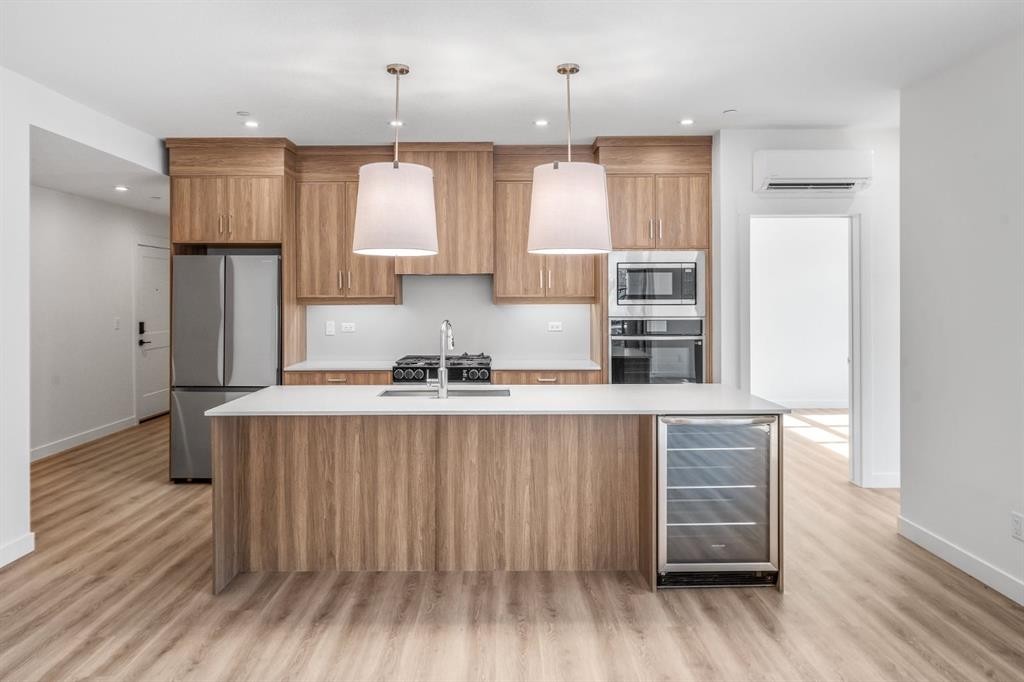 104-10 Cascade Ridge, Canmore, AB - Indoor Photo Showing Kitchen