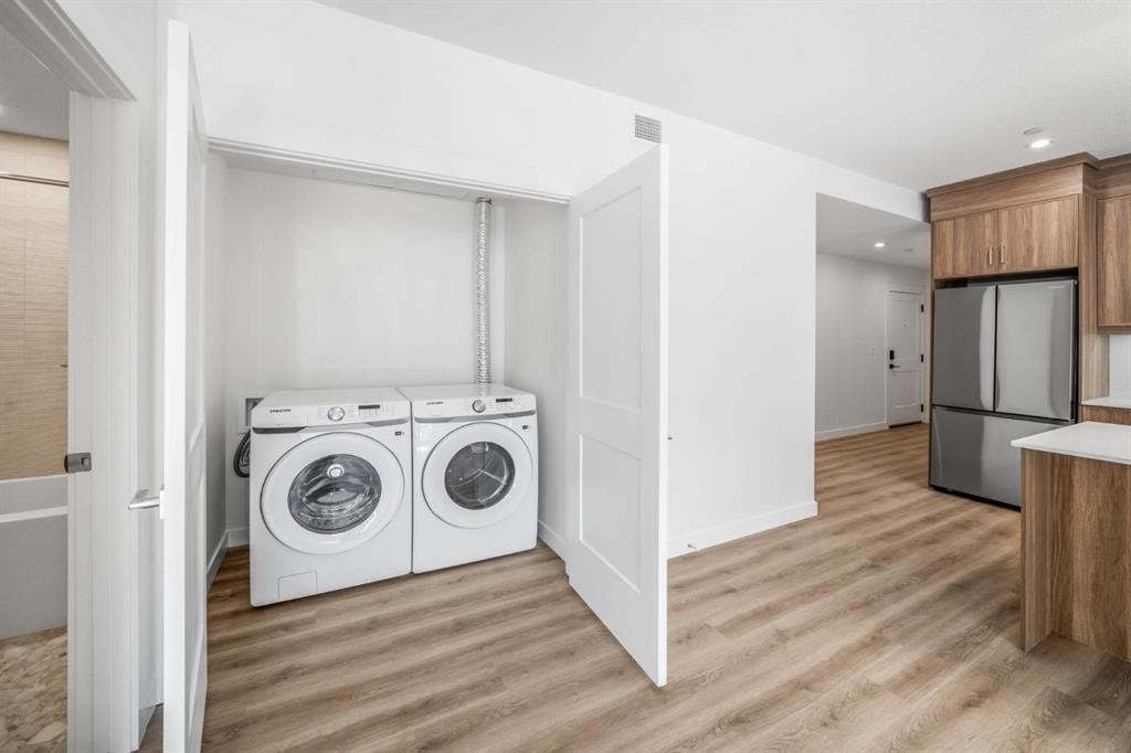 104-10 Cascade Ridge, Canmore, AB - Indoor Photo Showing Laundry Room