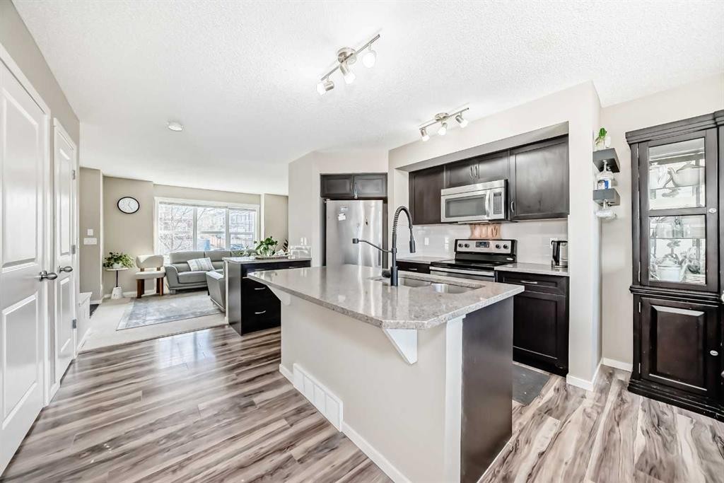 120 Evansridge Court Nw, Calgary, AB - Indoor Photo Showing Kitchen With Stainless Steel Kitchen With Double Sink With Upgraded Kitchen