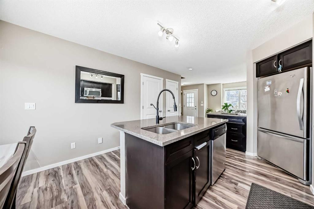 120 Evansridge Court Nw, Calgary, AB - Indoor Photo Showing Kitchen With Stainless Steel Kitchen With Double Sink