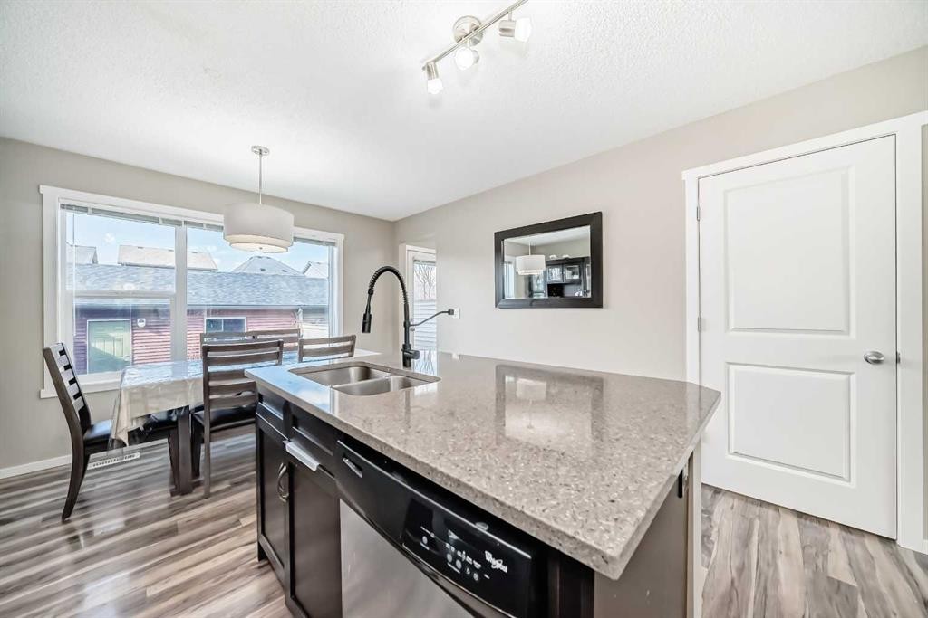 120 Evansridge Court Nw, Calgary, AB - Indoor Photo Showing Kitchen With Double Sink