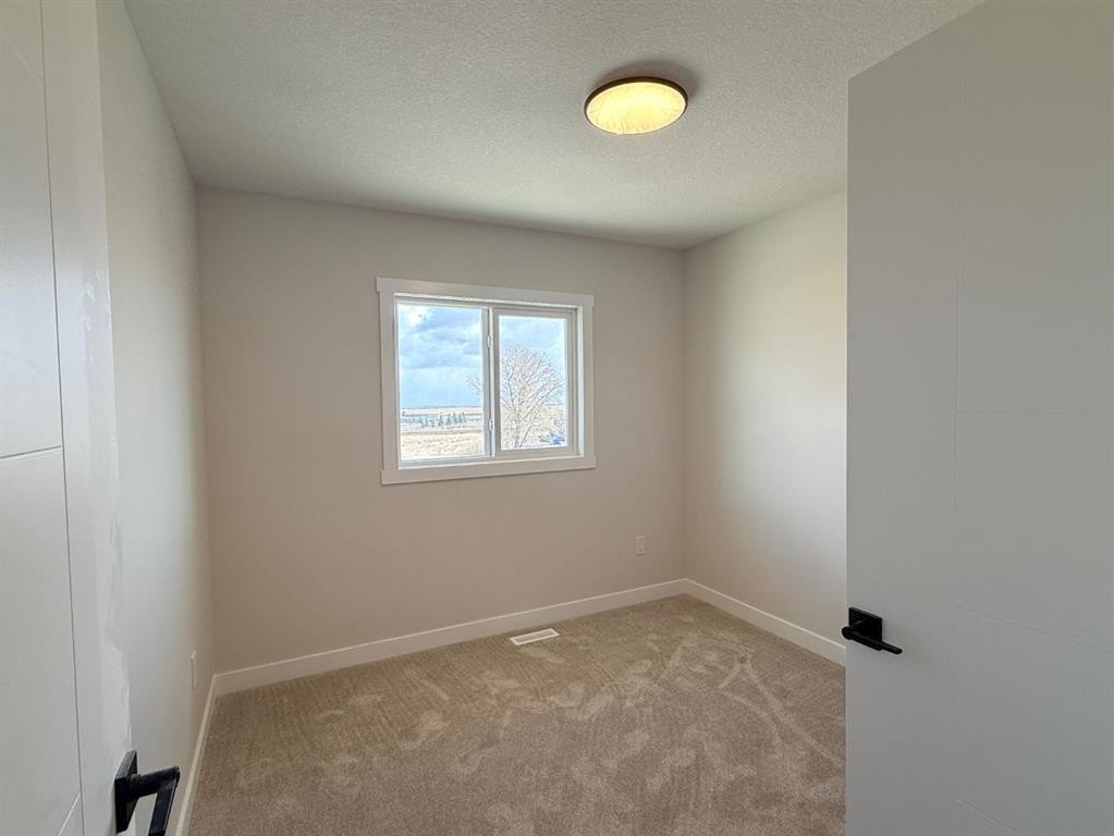 1927 Mccaskill Drive, Crossfield, AB - Indoor Photo Showing Other Room