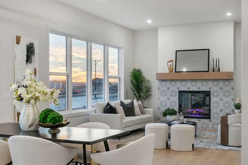 341 Limestone Bay, Balzac, AB - Indoor Photo Showing Living Room With Fireplace