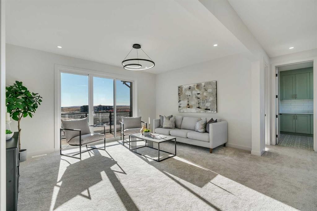 341 Limestone Bay, Balzac, AB - Indoor Photo Showing Living Room