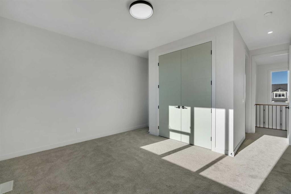 341 Limestone Bay, Balzac, AB - Indoor Photo Showing Other Room