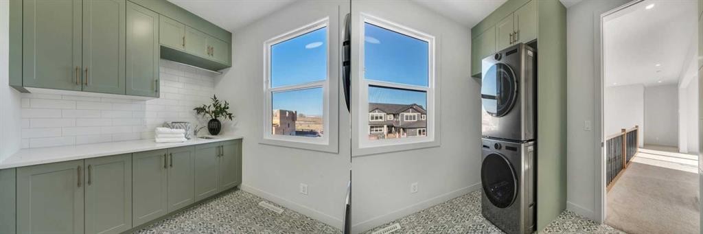 341 Limestone Bay, Balzac, AB - Indoor Photo Showing Laundry Room