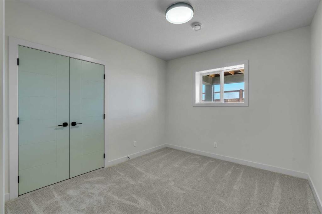 341 Limestone Bay, Balzac, AB - Indoor Photo Showing Other Room