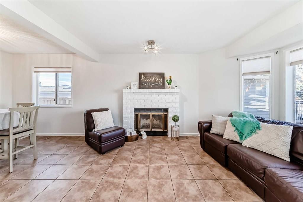 11 Martinridge Place Ne, Calgary, AB - Indoor Photo Showing Living Room With Fireplace