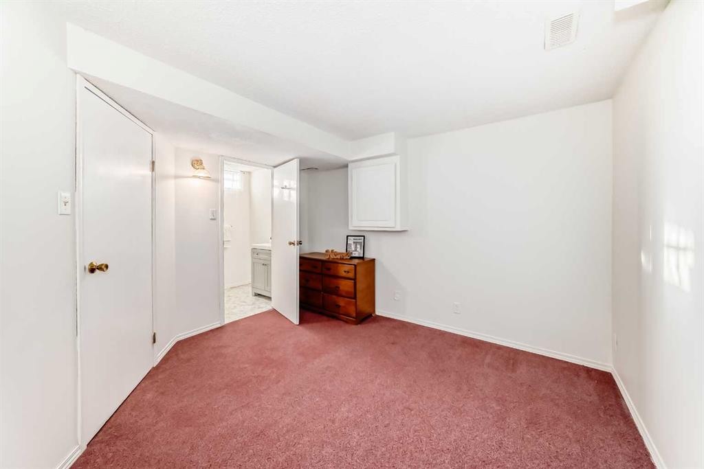 11 Martinridge Place Ne, Calgary, AB - Indoor Photo Showing Other Room