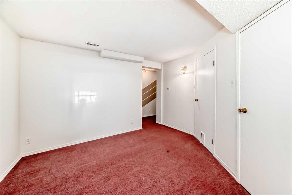 11 Martinridge Place Ne, Calgary, AB - Indoor Photo Showing Other Room