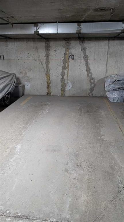 1202-2395 Eversyde Avenue Sw, Calgary, AB - Indoor Photo Showing Garage