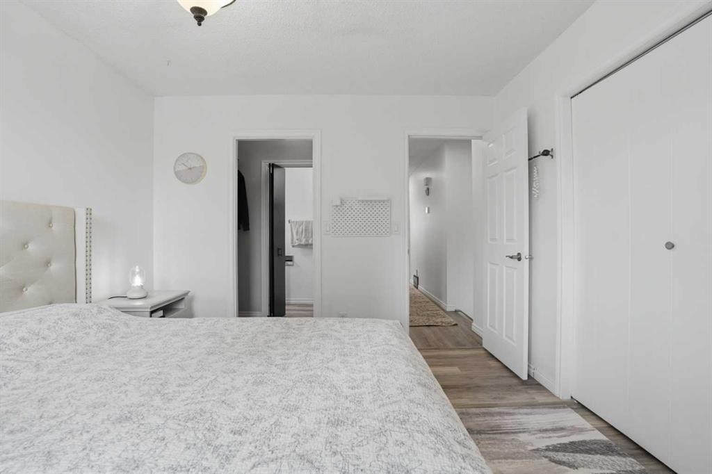 203 Shawglen Road Sw, Calgary, AB - Indoor Photo Showing Bedroom