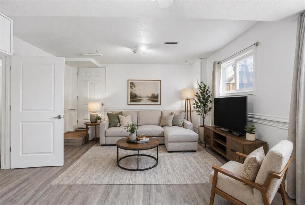 203 Shawglen Road Sw, Calgary, AB - Indoor Photo Showing Living Room