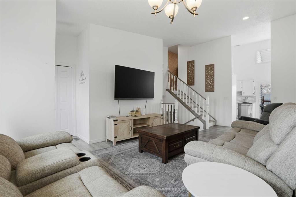 203 Shawglen Road Sw, Calgary, AB - Indoor Photo Showing Living Room