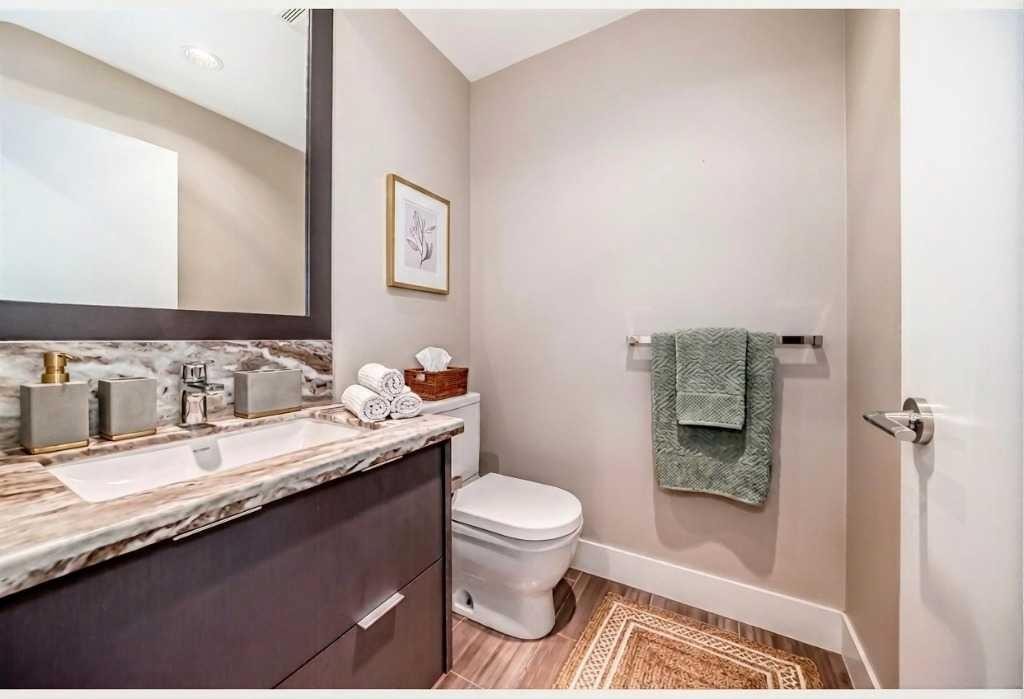 554 Riverfront Lane Se, Calgary, AB - Indoor Photo Showing Bathroom