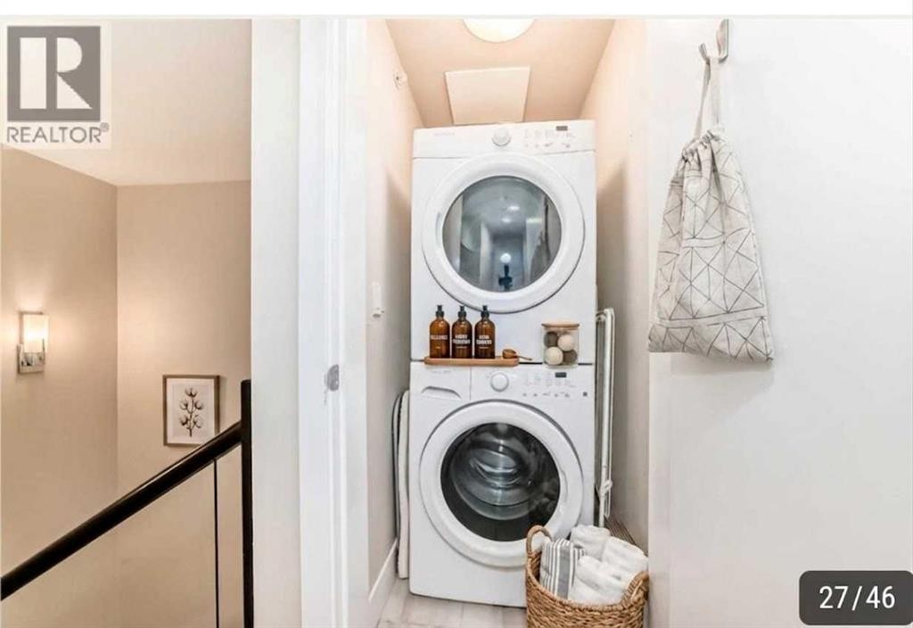 554 Riverfront Lane Se, Calgary, AB - Indoor Photo Showing Laundry Room