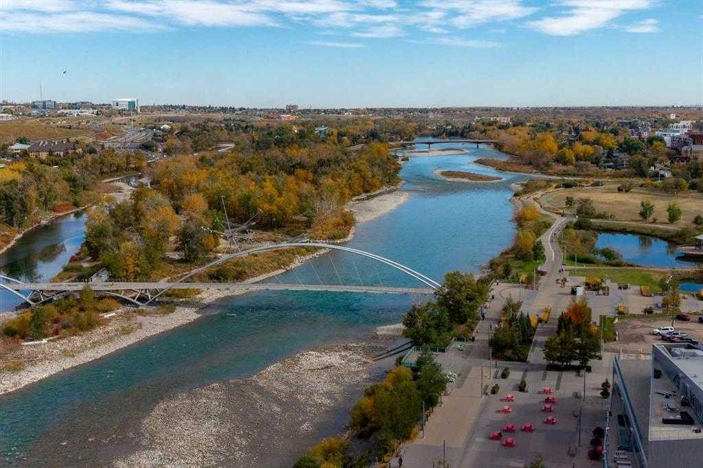 554 Riverfront Lane Se, Calgary, AB - Outdoor With Body Of Water With View