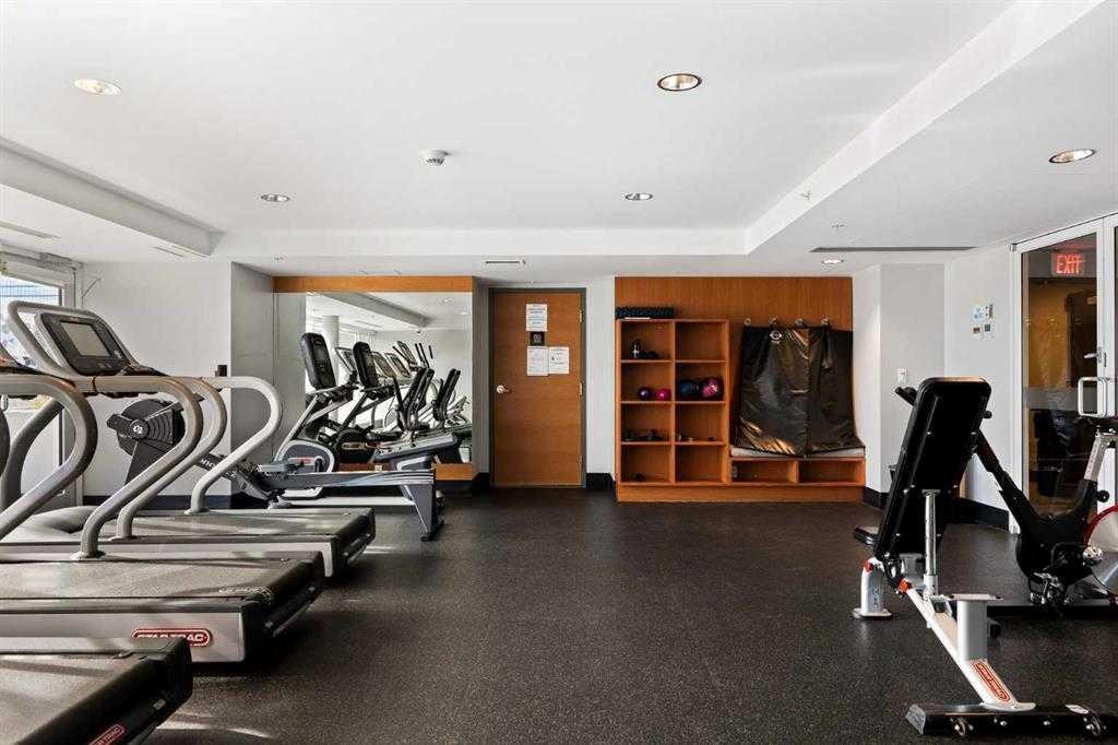 554 Riverfront Lane Se, Calgary, AB - Indoor Photo Showing Gym Room