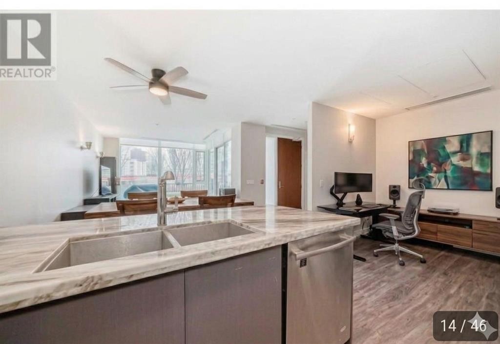 554 Riverfront Lane Se, Calgary, AB - Indoor Photo Showing Kitchen With Double Sink