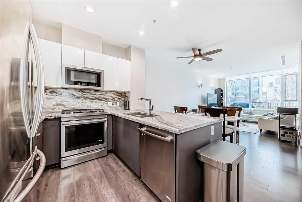 554 Riverfront Lane Se, Calgary, AB - Indoor Photo Showing Kitchen With Upgraded Kitchen
