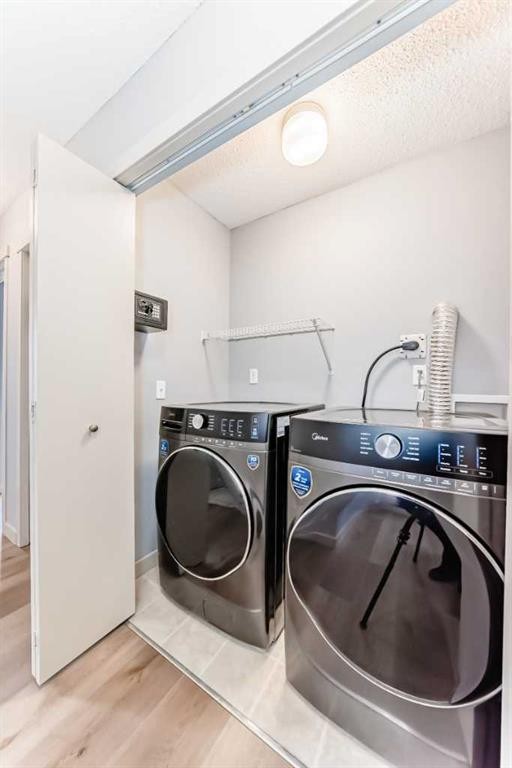 80 Copperstone Cove Se, Calgary, AB - Indoor Photo Showing Laundry Room