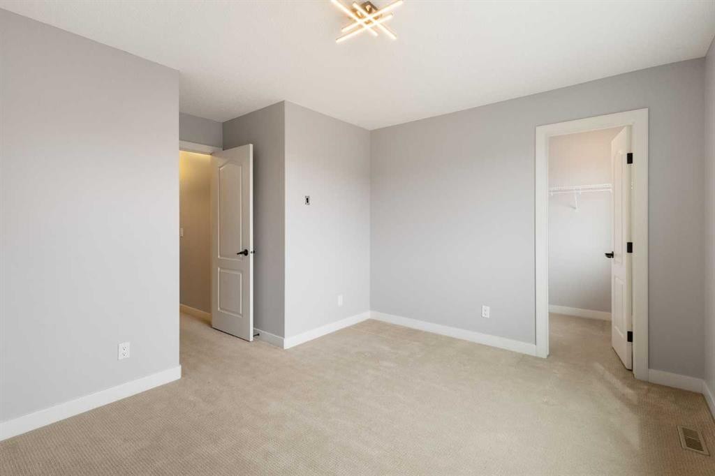 13 Sage Hill Landing Nw, Calgary, AB - Indoor Photo Showing Other Room