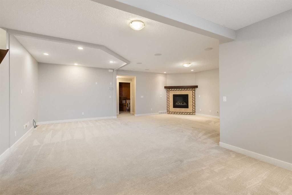 13 Sage Hill Landing Nw, Calgary, AB - Indoor With Fireplace