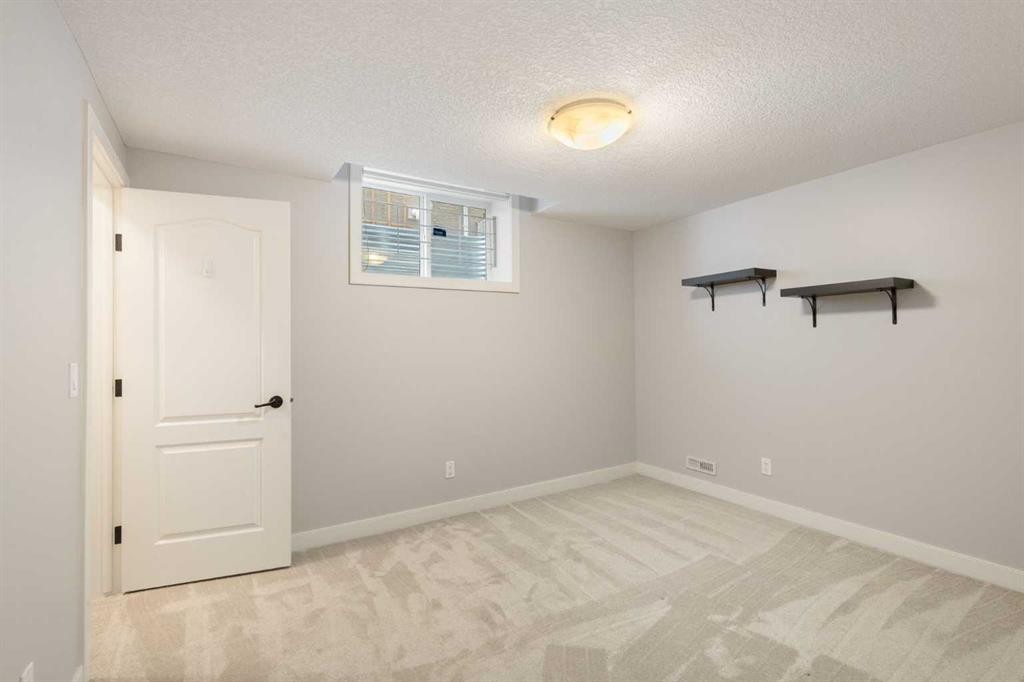 13 Sage Hill Landing Nw, Calgary, AB - Indoor Photo Showing Other Room