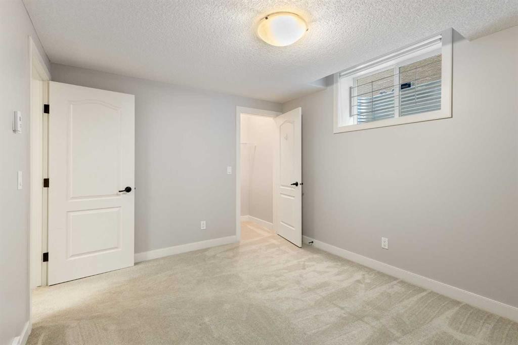 13 Sage Hill Landing Nw, Calgary, AB - Indoor Photo Showing Other Room