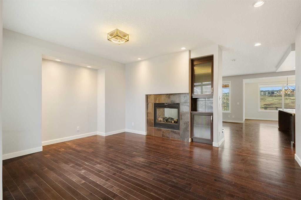 13 Sage Hill Landing Nw, Calgary, AB - Indoor Photo Showing Living Room With Fireplace
