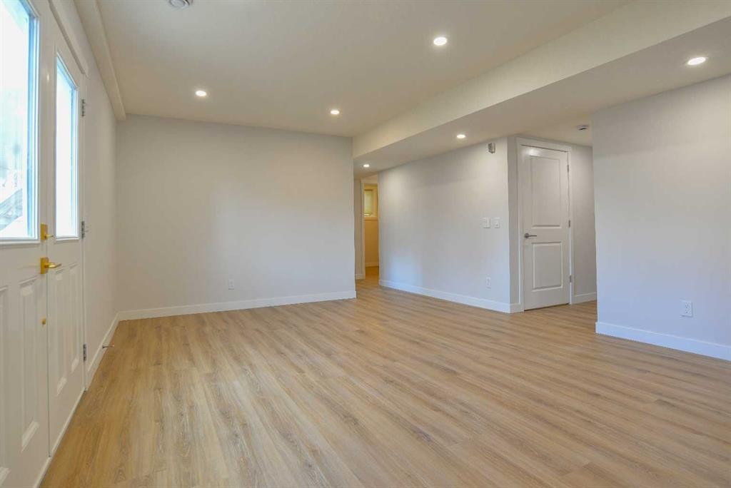 393 Hawktree Circle Nw, Calgary, AB - Indoor Photo Showing Kitchen With Double Sink