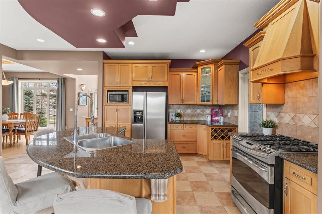 140 Simcoe Close Sw, Calgary, AB - Indoor Photo Showing Kitchen With Double Sink