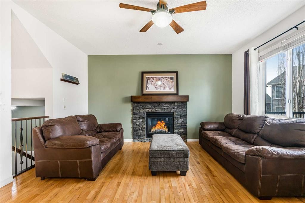 76 Heritage Hill, Cochrane, AB - Indoor Photo Showing Living Room With Fireplace