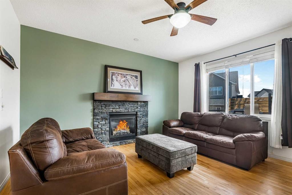 76 Heritage Hill, Cochrane, AB - Indoor Photo Showing Living Room With Fireplace