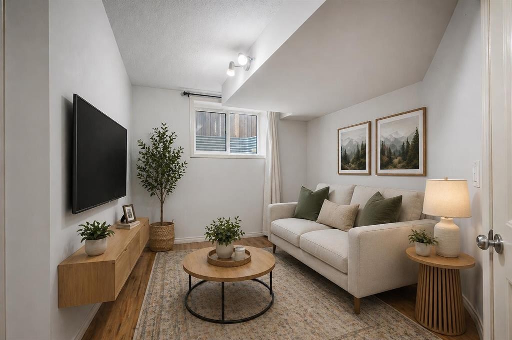 76 Heritage Hill, Cochrane, AB - Indoor Photo Showing Living Room