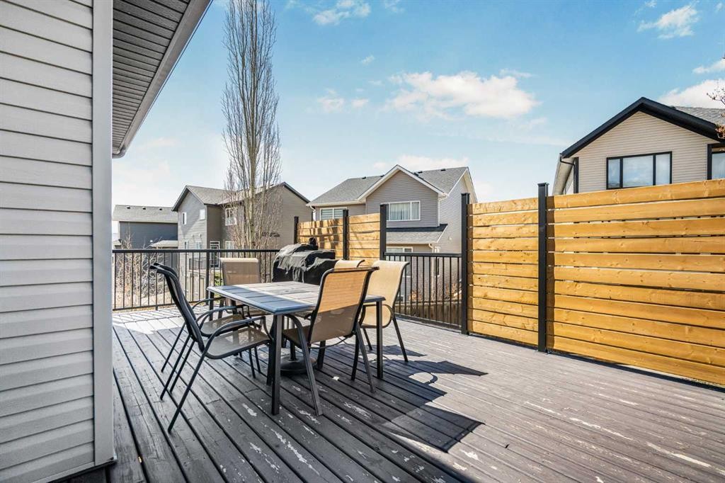 76 Heritage Hill, Cochrane, AB - Outdoor With Deck Patio Veranda With Exterior