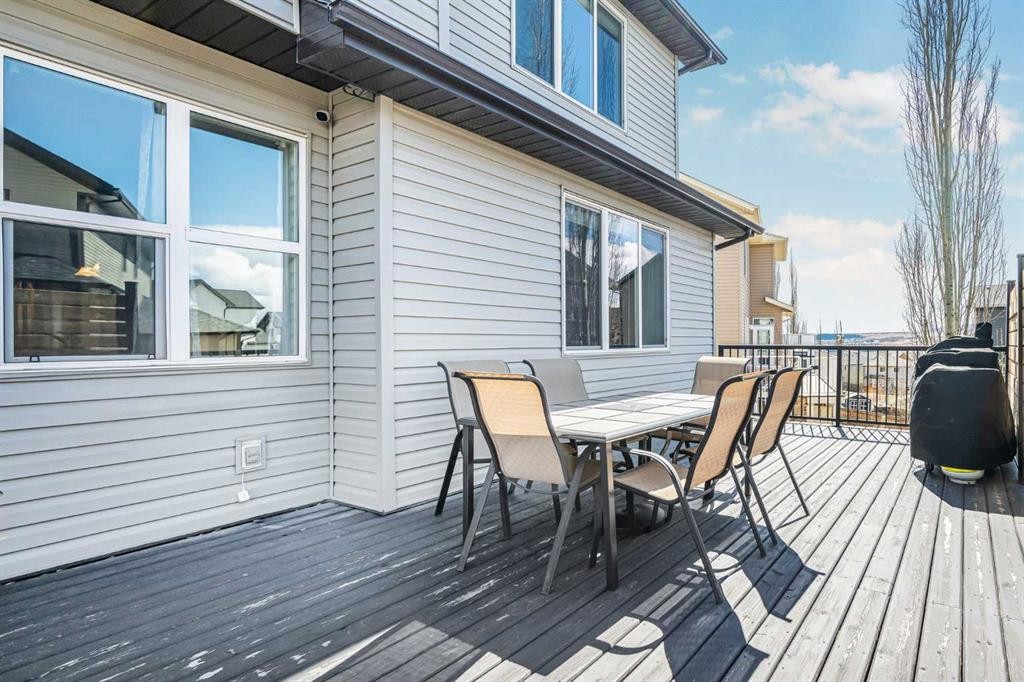 76 Heritage Hill, Cochrane, AB - Outdoor With Deck Patio Veranda With Exterior