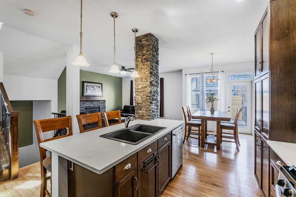 76 Heritage Hill, Cochrane, AB - Indoor Photo Showing Kitchen With Double Sink