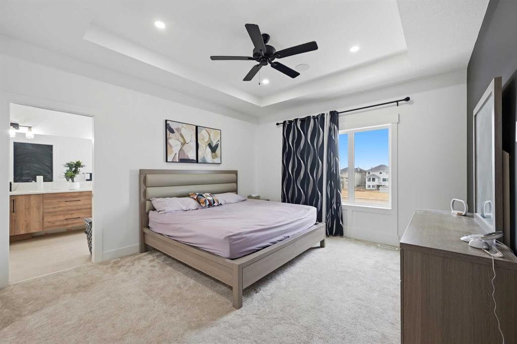 180 South Shore, Chestermere, AB - Indoor Photo Showing Bedroom