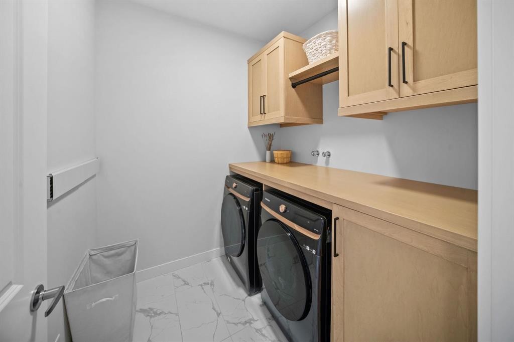 84 Saltsage Heath, Rural Rocky View County, AB - Indoor Photo Showing Laundry Room