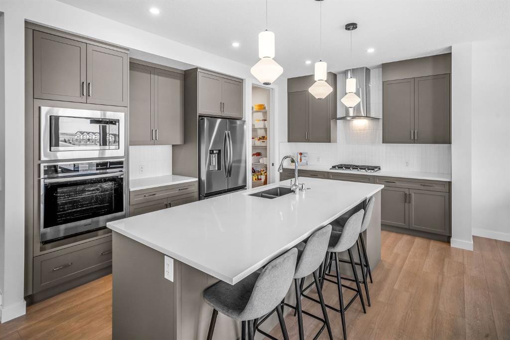 84 Saltsage Heath, Rural Rocky View County, AB - Indoor Photo Showing Kitchen With Double Sink With Upgraded Kitchen