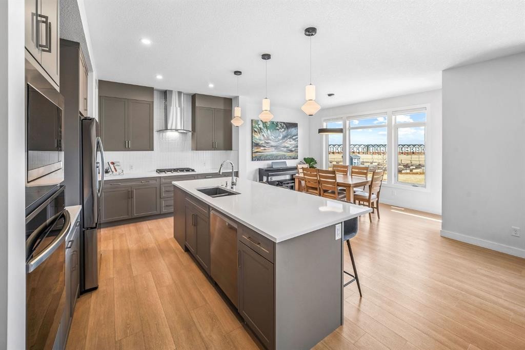 84 Saltsage Heath, Rural Rocky View County, AB - Indoor Photo Showing Kitchen With Double Sink With Upgraded Kitchen