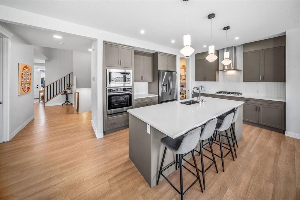 84 Saltsage Heath, Rural Rocky View County, AB - Indoor Photo Showing Kitchen With Upgraded Kitchen